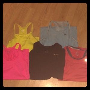 Good Preowned Nike Women’s workout shirts. MEDIUM